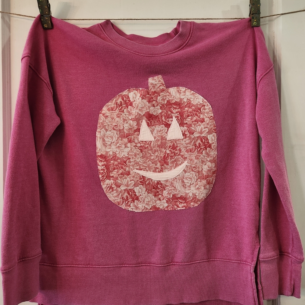 Pink Sweatshirt with Floral Pumpkin Design